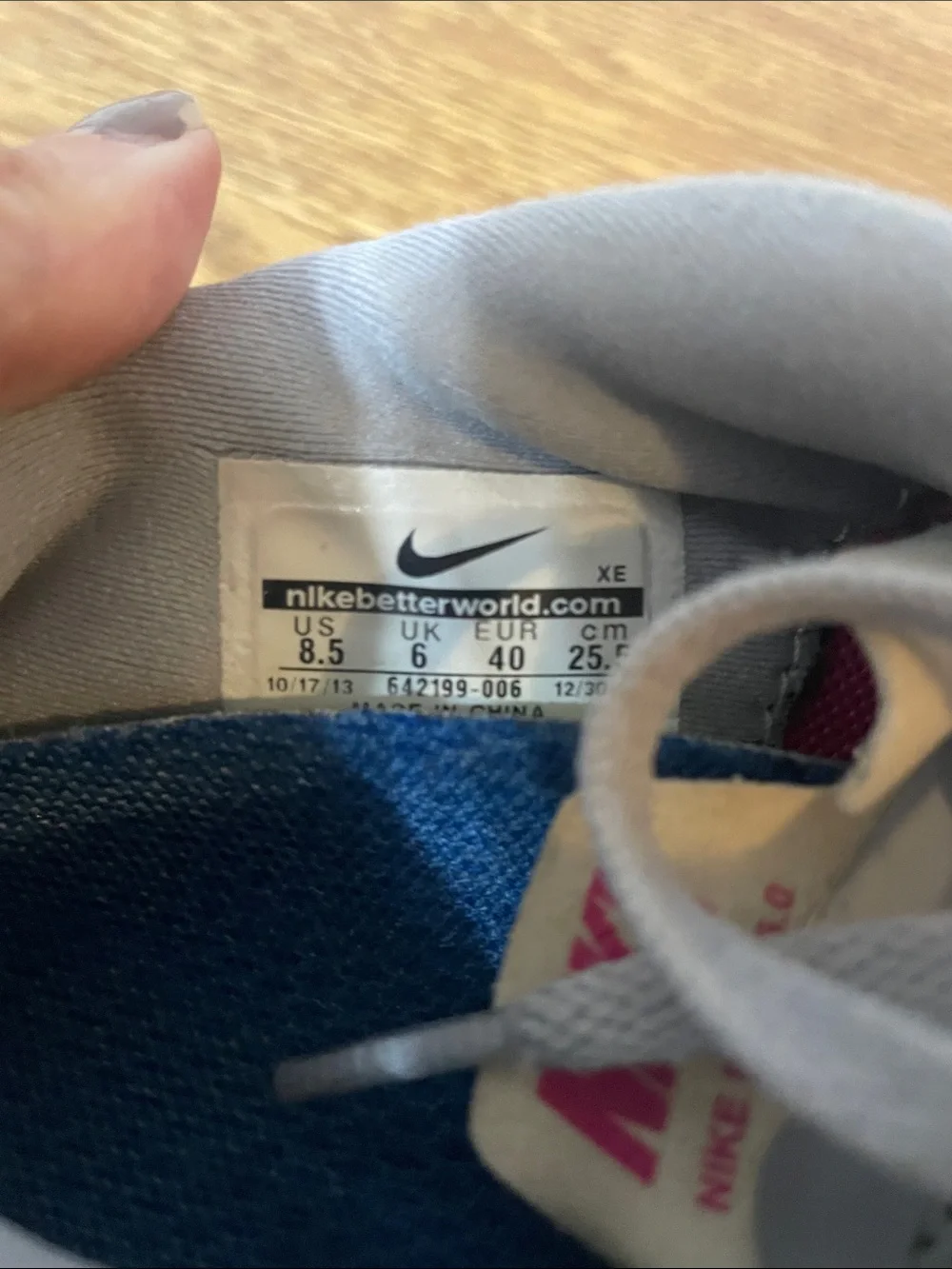 Nike Women’s Gray Athletic Shoes with Pink Swoosh
